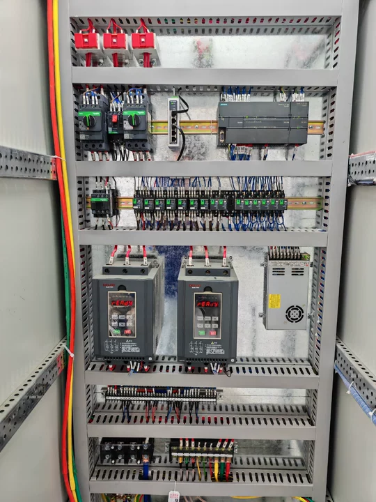 Automation control cabinet showing internal electrical components and wiring